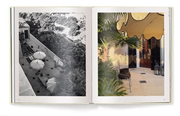 Book cover of Creating a New Home in Mallorca; featuring a hallway with a grand arch, and black and white floor tiles. Published by teNeues Books.