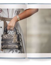 Book cover of The Ultimate Guide to Dior Bags; featuring Dior's saddle bag. Published by teNeues Books.
