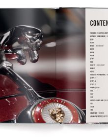 Book cover of The Jaguar Book: Collector's Edition; featuring the front of a black car. Published by teNeues Books.