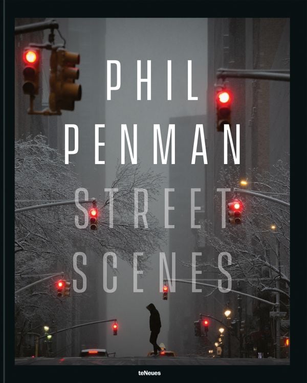 Book cover of Phil Penman: Street Scenes; featuring a figure walking across a misty street with traffic lights on red. Published by teNeues Books.