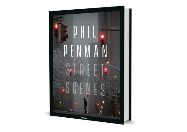 Book cover of Phil Penman: Street Scenes; featuring a figure walking across a misty street with traffic lights on red. Published by teNeues Books.