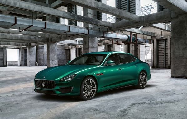 Book cover of The Maserati Book; featuring a car with vertical doors. Published by teNeues Books.
