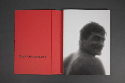 Book cover of Walking Distance, with red filter over seascape, vertical red line to centre. Published by Verlag Kettler.