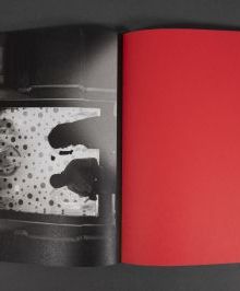 Book cover of Walking Distance, with red filter over seascape, vertical red line to centre. Published by Verlag Kettler.