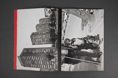 Book cover of Walking Distance, with red filter over seascape, vertical red line to centre. Published by Verlag Kettler.