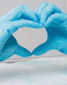 Book cover of Gaëlle Choisne, Temple of Love, featuring a black woman holding piece of pale blue fabric near head. Published by Verlag Kettler.