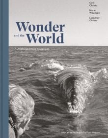 Book cover of Wonder and the World: A Childhood Among the Species, featuring a duotone photograph of a person looking at a large whale swimming near the sea's surface. Published by Verlag Kettler.