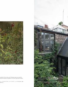 Magazine cover of a+u 21:07, 610: Feature: House Looking into the World, with an interior living space with spiral staircase, houseplants, and white rugs. Published by Shinkenchiku-Sha Co., Ltd.