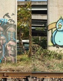 Graffiti style head with helmet, dripping pain, BANGKOK STREET ART AND GRAFFITI in black font down right edge.