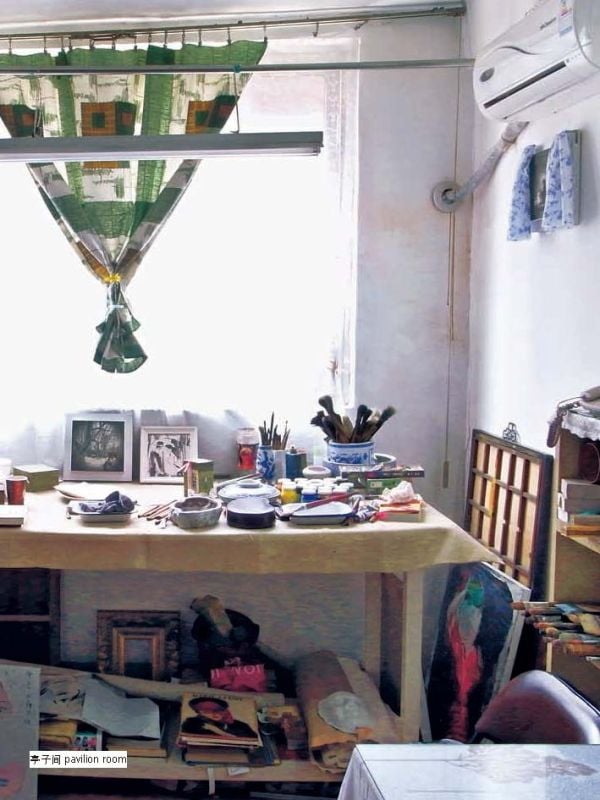 Book cover of Shanghai Shikumen, with a residential building, with trees to front. Published by Tongji University Press.