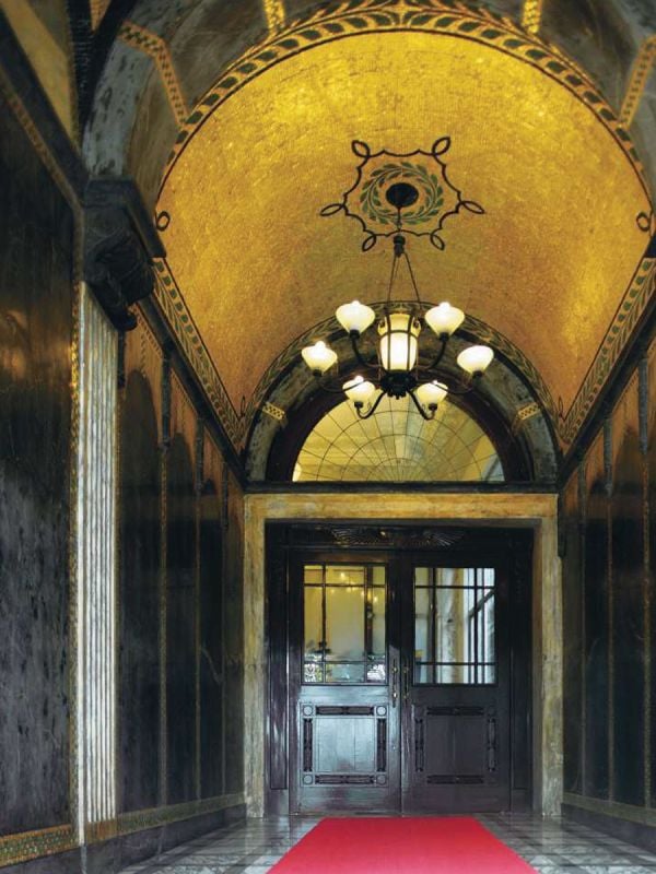 Book cover of Shanghai Bund Architecture, with a building with domed section. Published by Tongji University Press.