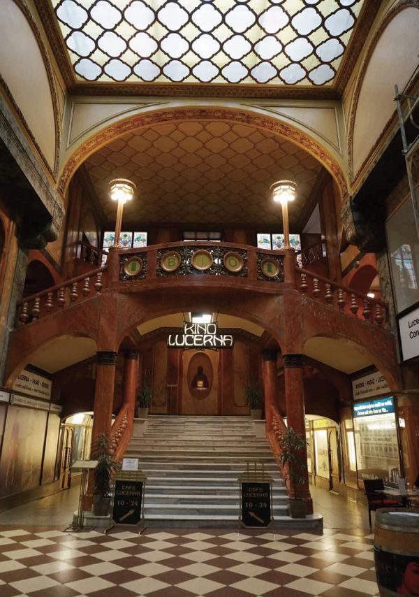 Yellow book cover of A Passage Through Prague Architecture, with cathedral building. Published by Tongji University Press.