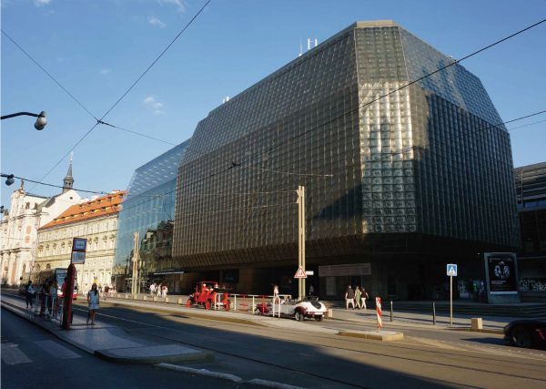Yellow book cover of A Passage Through Prague Architecture, with cathedral building. Published by Tongji University Press.