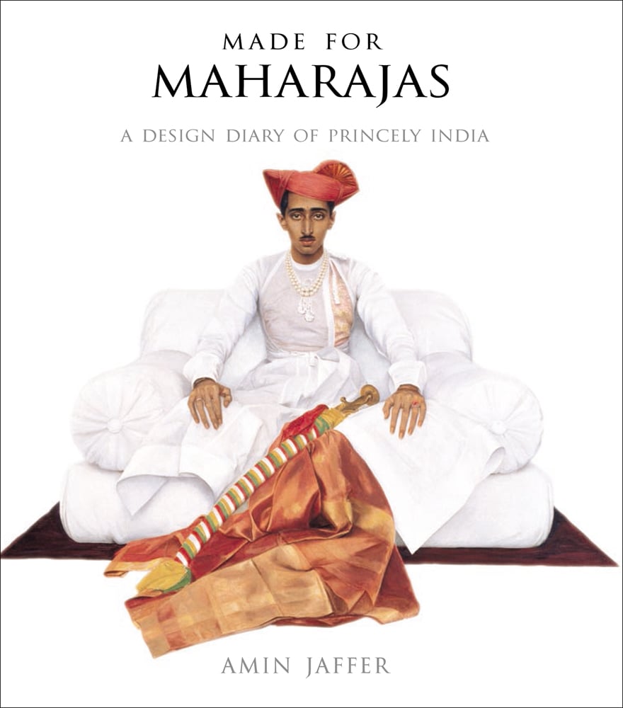 Maharaja in white with red cap, sitting on white floor couch, on white cover, Made for Maharajas in black font above