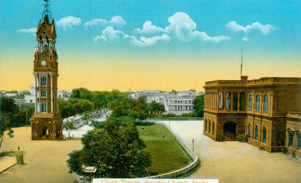 Book cover of Paper Jewels: Postcards from the Raj, with two Indian men: one with sword and one carrying a sack. Published by Mapin Publishing.