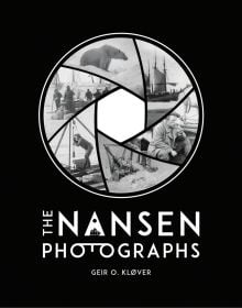 Shutter shape of shots from arctic expedition, on black cover, THE NANSEN PHOTOGRAPHS, in white font below.