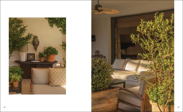 Book cover of Luisa Olazábal: LO·2 Studio, featuring an interior living space with wood table and chairs, and a curved cupboard. Published by Ediciones El Viso.