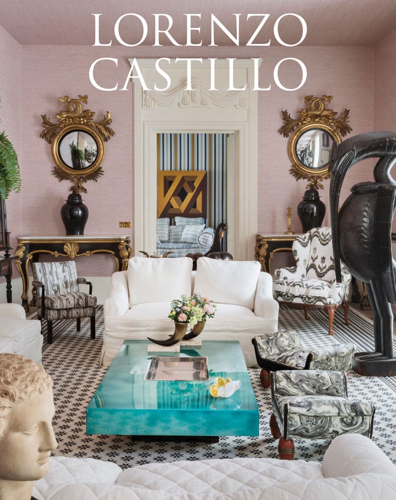 Luxury interior with patterned rug, gold mirrors, cream furnishings, carved statue, Lorenzo Castillo in white font above