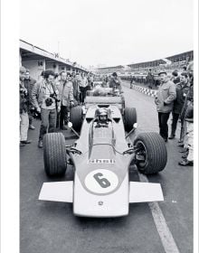 Book cover of Formula 1 - The Art Dimension; with a red F1 Ferrari. Published by Helmin & Sorgenfri.