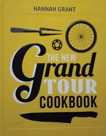 Book cover of The New Grand Tour Cookbook 2; featuring a knife and a bike wheel. Published by Helmin & Sorgenfri.