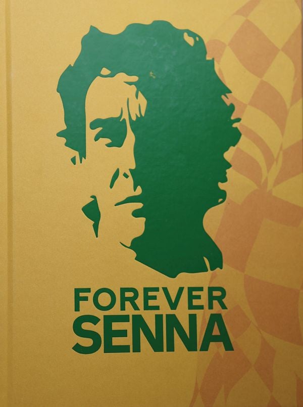 Book cover of Forever Senna; featuring the Brazilian racing driver Ayrton Senna. Published by Helmin & Sorgenfri.