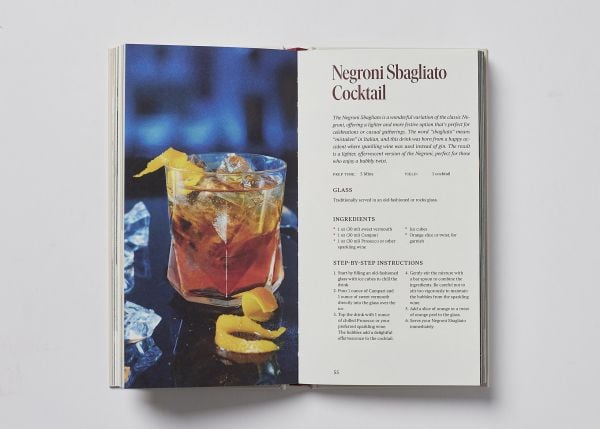 Book cover of Vermouth: A Classic Revival; featuring a cocktail, with an olive on a stick. Published by Helmin & Sorgenfri.