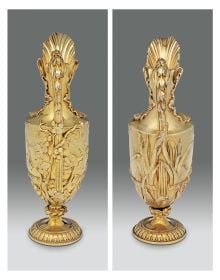 Female bronze and marble bust, ring of ivy on head, Valadier in gold font down left brown border.