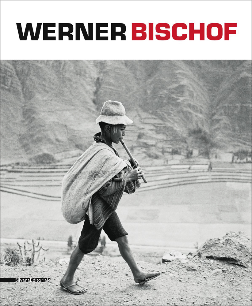 Book cover of Werner Bischof; with a boy walking along while playing a pipe. Published by Silvana.