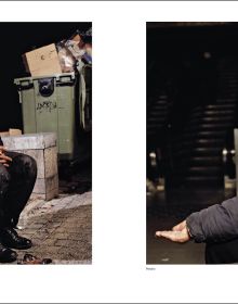 Book cover of Andres Serrano; with a homeless man laying under cardboard. Published by Silvana.