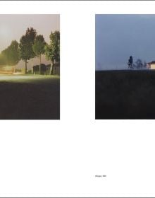 City square with buildings under night sky, blue cover, Luigi Ghirri Thought Landscapes in blue and white font above