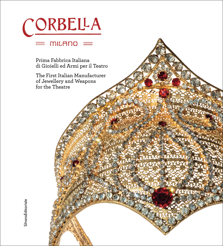 Diamond and ruby encrusted head piece, white cover, CORBELLA MILANO in red font to top left