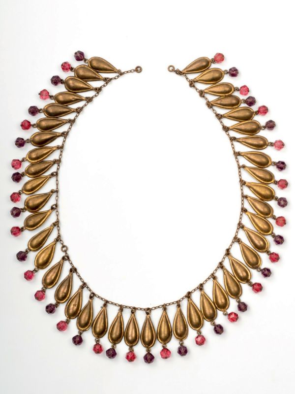Book cover of Corbella Milano: The First Italian Manufacturer of Jewellery and Weapons for the Theatre; with a jewelled head piece. Published by Silvana.