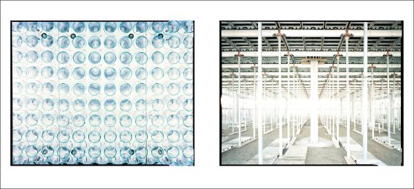 Photo of skeletal inside of cigarette factory during its construction with eerie shafts of light beaming through