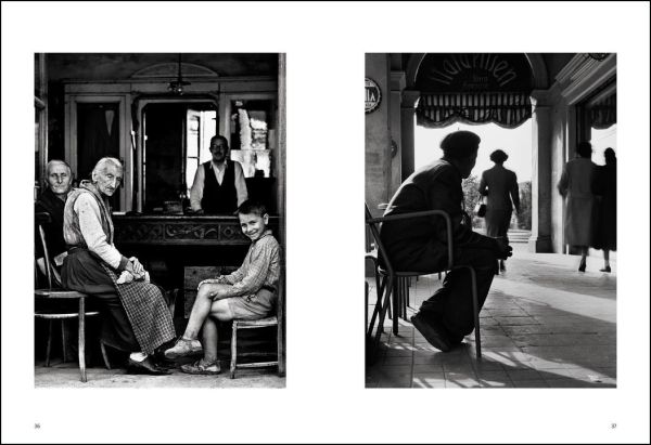 Black and white shot, People of Emilia, Emilia-Romagna 1959, 3 males seated outside café with motorcycle, NINO MIGLIORI in white font to top right.