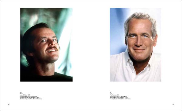 Marilyn Monroe in playful pose, laying beneath a white sheet on bed, Douglas Kirkland in black font to upper left.