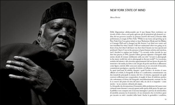 Louie Armstrong with eyes closed, holding trumpet in right hand, left index finger to mouth, JIMMY KATZ CLOSED SESSION in orange font to upper left.