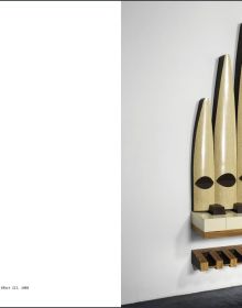 Close up collection of orange string fibres, RICHARD ARTSCHWAGER in black font above.