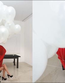 Mangiafuoco, 1979 by Pier Paolo Calzolari, man breathing fire into red canvas, Pier Paolo Calzolari Painting as a Butterfly in white font above.