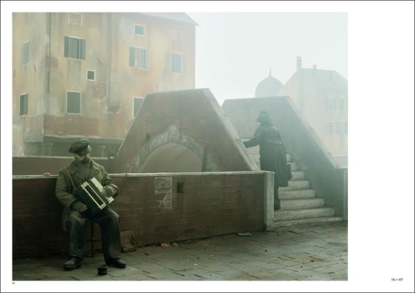 Surrealist painting of man being swallowed by large fish in blue sea, PAOLO VENTURA PHOTOGRAPHS AND DRAWINGS in red font above.