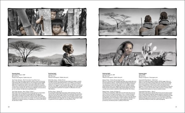 Two small children, one seated on table and one peering over, in grey woollen clothes and white cap with Phil Borges in white font above