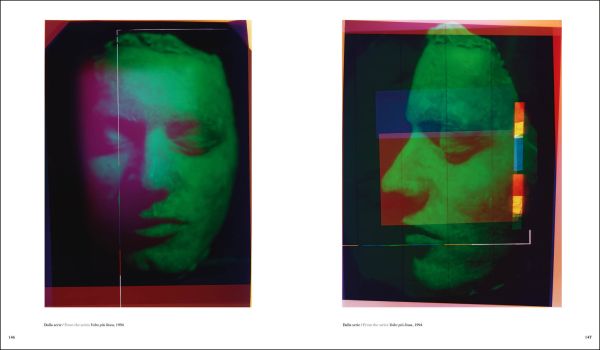 Blurred, grainy black and white photo of 2 faces touching, with eyes closed and Paolo Gioli in yellow font above