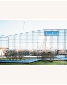Book cover of ACPV ARCHITECTS Antonio Citterio Patricia Viel: as seen by Carlo Valsecchi, with a building with panes of glass reflecting the surrounding environment. Published by Silvana.