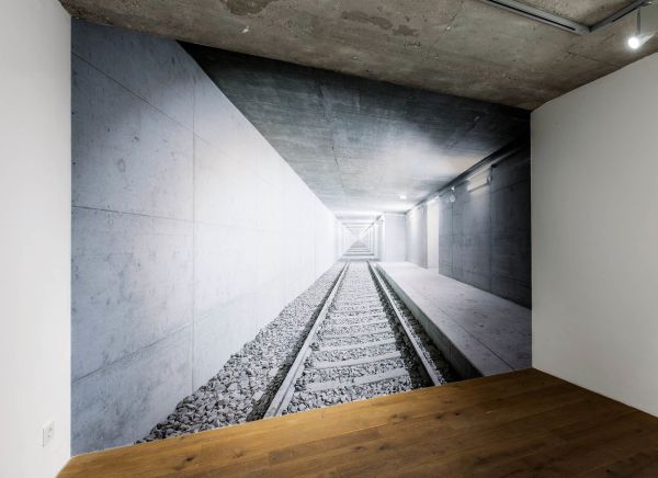 THE ARCHITECTURE OF in white font to top edge, DECEPTION CONFINEMENT TRANSFORMATION in black font to centre.