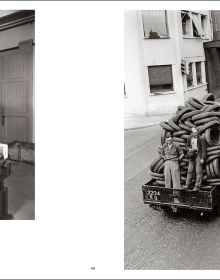 Black and white photo of child by side of road leaning forward to look at water running down road with Robert Doisneau in white font