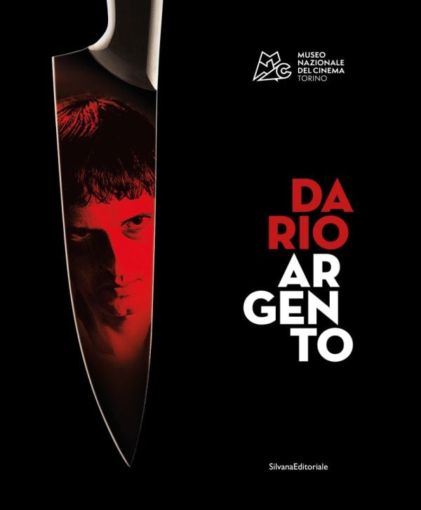 Book cover of Dario Argento: The Exhibition, with portrait of the Italian film director reflected in sharp knife, Published by Silvana.
