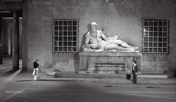 Book cover of Dario Argento: The Exhibition, with portrait of the Italian film director reflected in sharp knife, Published by Silvana.