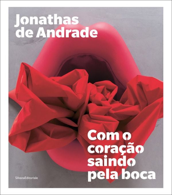 Book cover of Jonathas de Andrade Com o coração saindo pela boca, with a photo of installation titled 'With the Heart Coming Out of Mouth'. Published by Silvana.
