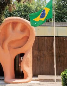 Book cover of Jonathas de Andrade Com o coração saindo pela boca, with a photo of installation titled 'With the Heart Coming Out of Mouth'. Published by Silvana.