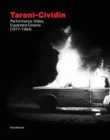 Book cover of Taroni-Cividin, Performance, Video, Expanded Cinema (1977-1984), with an old car on fire. Published by Silvana.