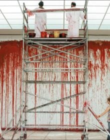 Book cover of Hermann Nitsch, featuring the artist's red paint splattered canvas. Published by Silvana.